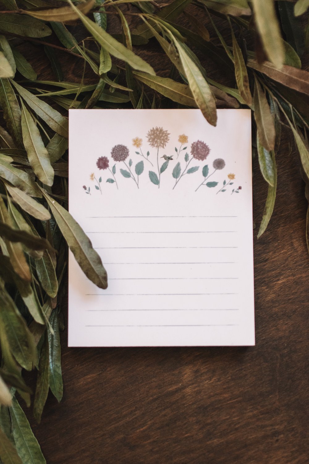 A Hummingbird Among Dahlias