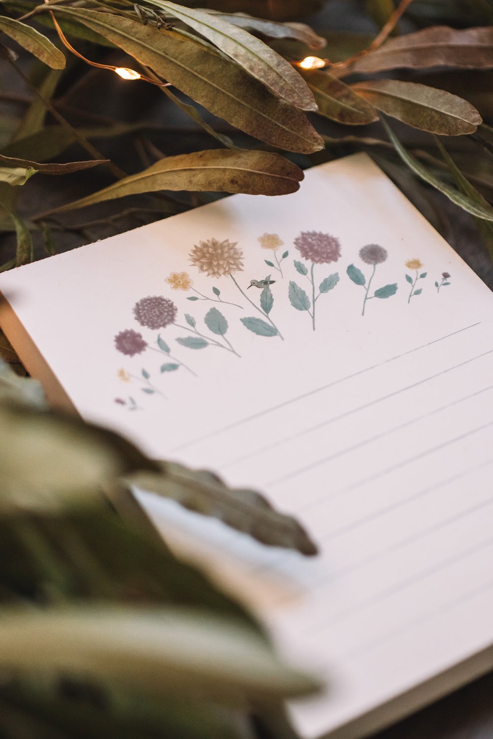 A Hummingbird Among Dahlias